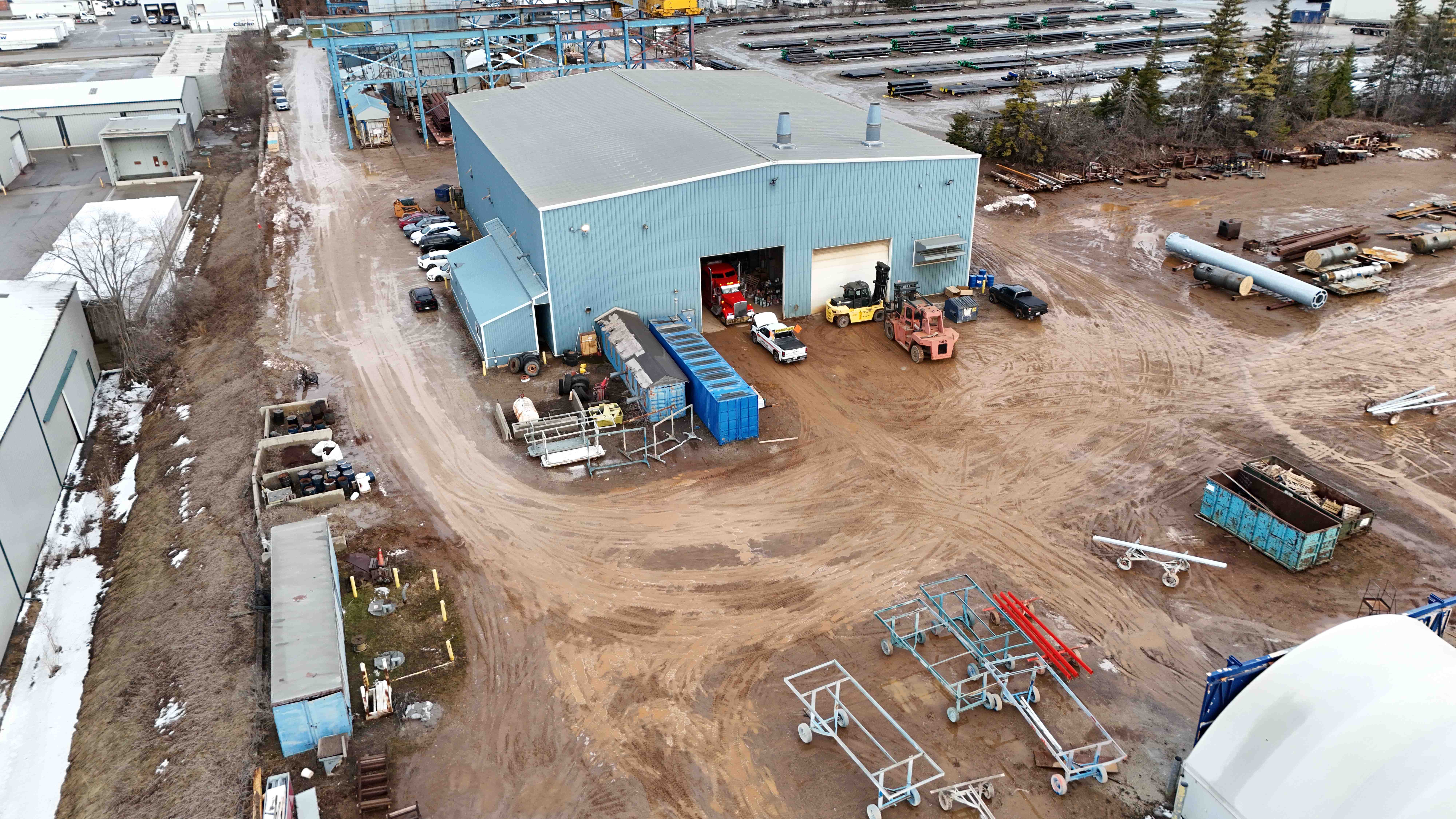 Aerial view of industrial facility yard with equipment
